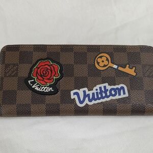 Authentic Limited Edition Louis Vuitton Damier Ebene Stories Zippy Wallet